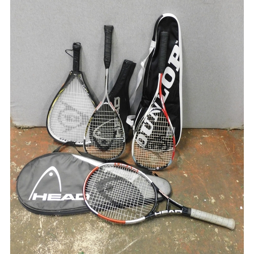 77 - Two squash rackets; Head and Dunlop, tennis racket; Head and softball racket; Dunlop