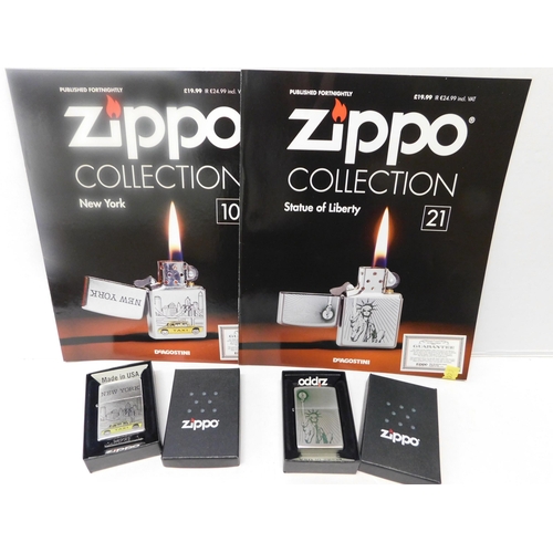 565 - 2 boxed Zippo lighters with paperwork - New York and Statue of Liberty