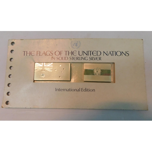 422 - Two silver ingots 'The Flags of the United Nations'