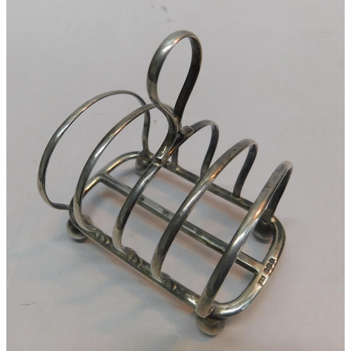 357 - Small antique sterling silver toast rack 77.6g Sheffield 1919