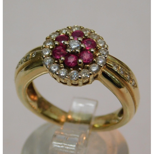 415 - 14K Gold ring set with ruby's and 23 diamonds - RRP £1000, combined weight 6.66g