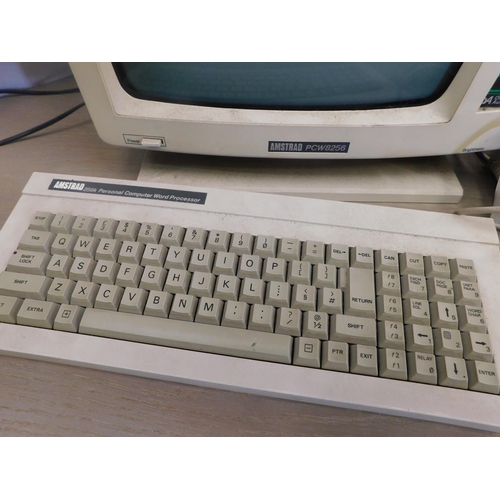 147 - Vintage Amstrad PCW8256 monitor, keyboard and printer - unchecked