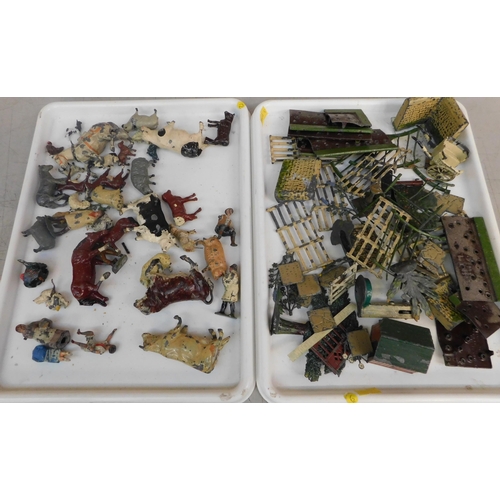 160 - Two trays of vintage lead Britains figures, accessories etc.