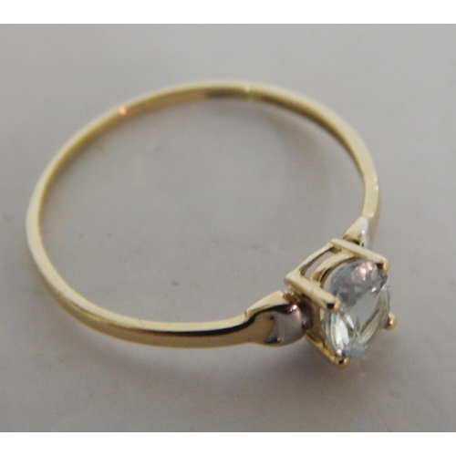 438 - 9ct Gold aquamarine solitaire ring - size N 1/2