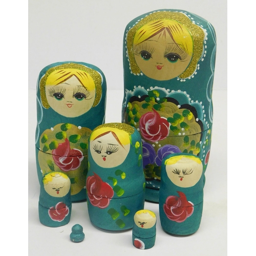 447 - Set of hand painted Russian dolls