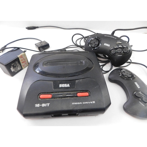 451 - Sega mega drive II 16 bit console and two controllers - unchecked