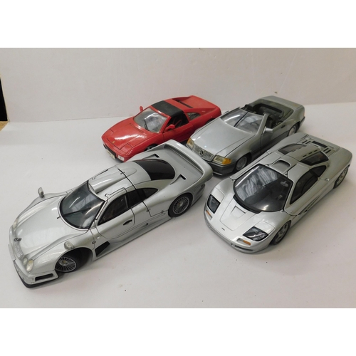 498 - Four large scale diecast model vehicles...