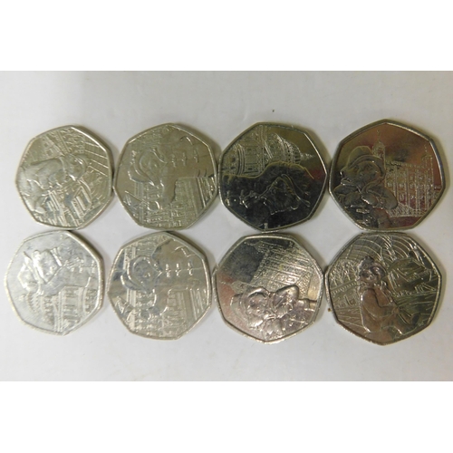 512 - Eight Paddington Bear 50p pieces - 2018 and 2019...