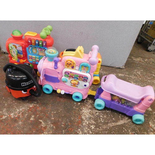 165 - Two kid's ride-on toys and mini Henry Hoover