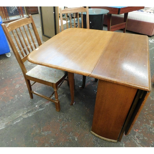 299 - Drop leaf table and two chairs