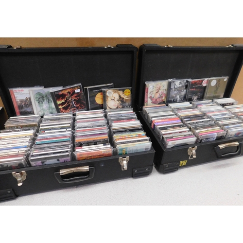 328 - Two large cases of mixed genre CDs