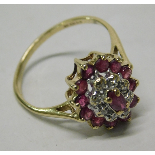 407 - 9ct Gold ruby and diamond oval cluster - size N 1/2