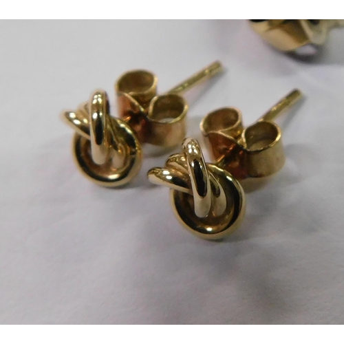 427 - Two pair of gold knot stud earrings