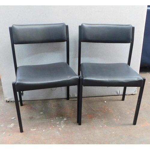 54 - Pair of black reception chairs