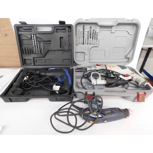 10 - Two cased electric drills and one other - unchecked