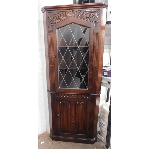 270 - Solid oak corner cabinet with leaded glass