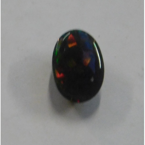 416 - Genuine black opal (originally shanked in a ring) - 0.55ct