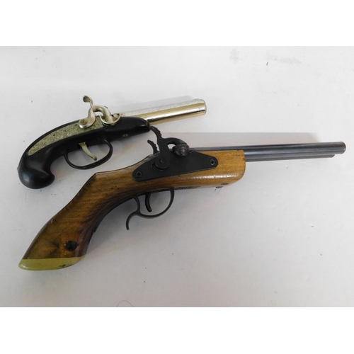 428 - Two replica guns - incl. flintlock style lighter