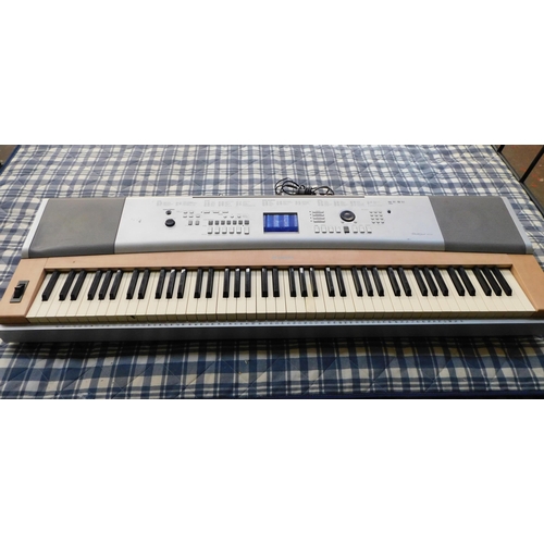 122 - Yamaha portable grand keyboard DGX-620 W/O with charger & USB cable