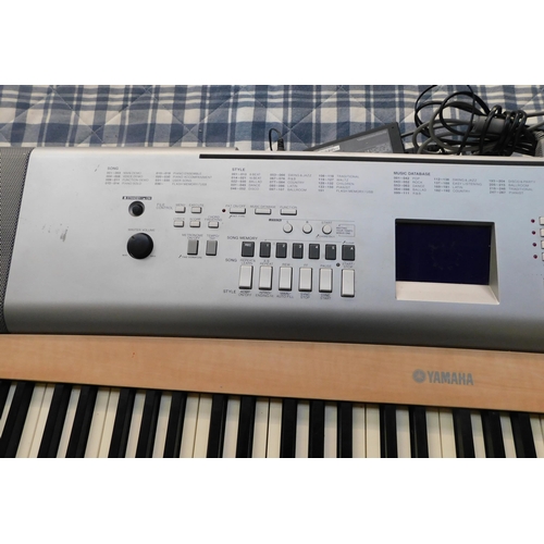 122 - Yamaha portable grand keyboard DGX-620 W/O with charger & USB cable