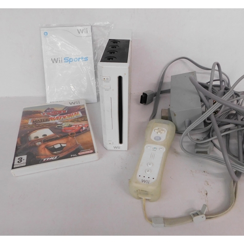 129 - Wii console, controller and game - unchecked