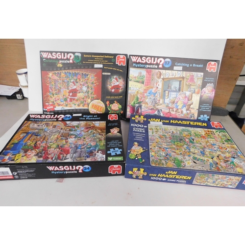 159 - Three 'Wasgij' jigsaws and one other - labelled as complete