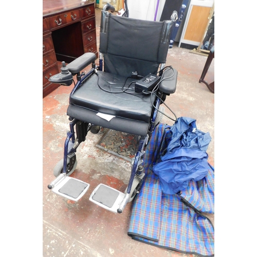 177 - Electric motorised wheel chair, charger and accessories - unchecked