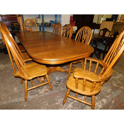 296 - Large extending table and eight chairs (6x dining 2x carver inc 2x extra leaves)