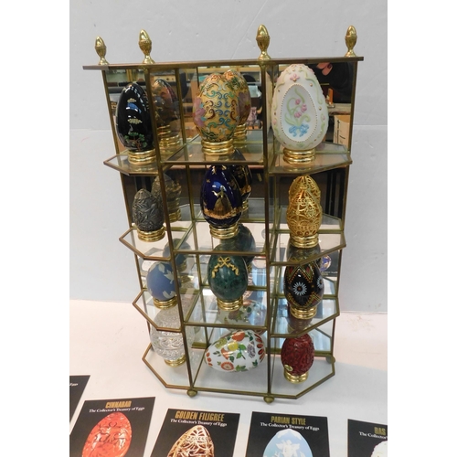 575 - Small display cabinet with franklin mint treasury of eggs limited edition and certificates