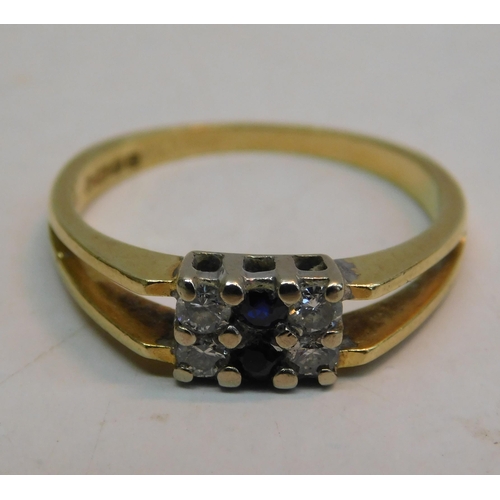 428A - 18ct Gold 0.20ct diamond and sapphire ladies ring - size O 1/2 (3.07g)