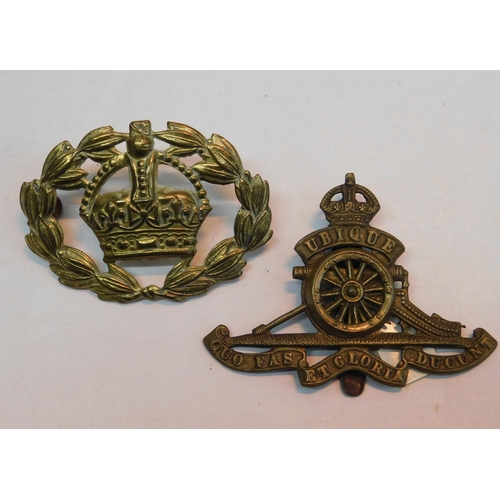 440 - British Army warrant officers brass sleeve badge and Royal Artillery WWI rotating wheel badge