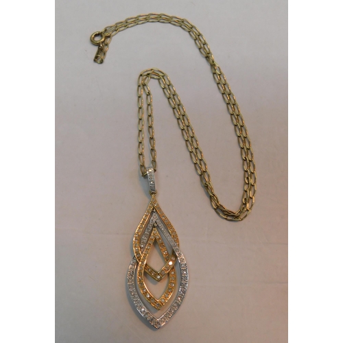 532 - 9ct Gold curb link chain and 0.75ct diamond cluster pendant - Birmingham 1972 (5.52g)