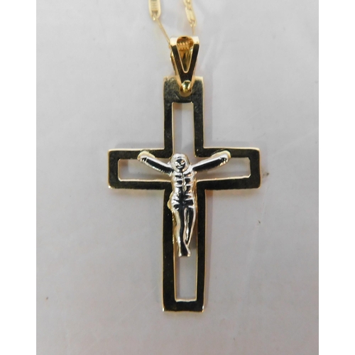 569 - 18ct Gold anchor link neck chain and crucifix - weight 2.80g