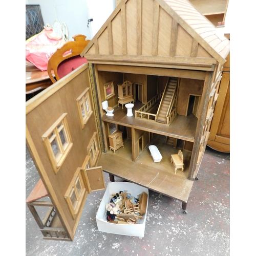 271 - Large wooden dolls house with furniture - approx. 42