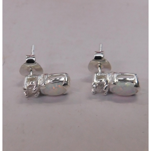 435 - Pair of silver opal set earrings