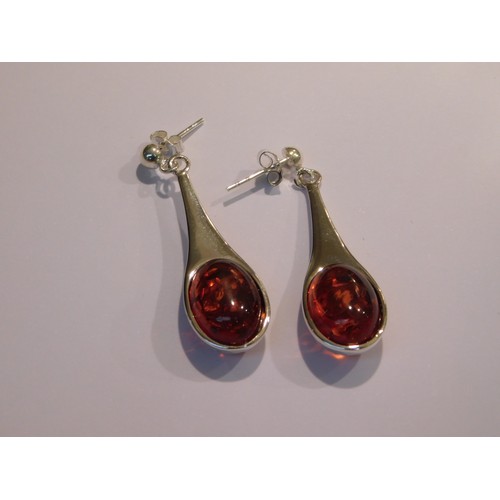 432 - Pair of silver and amber earrings