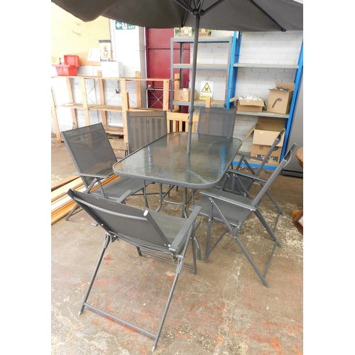 180 - Outdoor table, six chairs and wind up parasol - table is 55