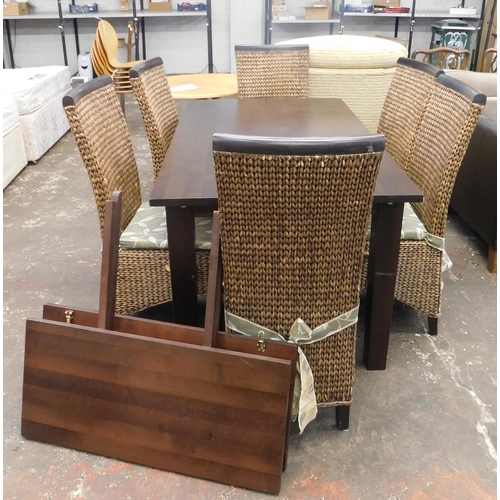 229 - Dining table and six woven rattan high backed dining chairs