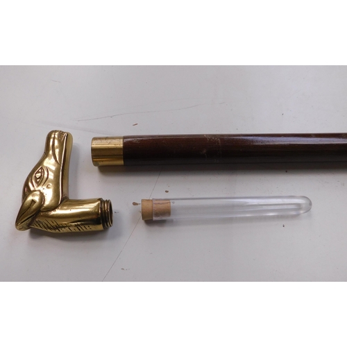 411 - Brass topped walking stick with secret test tube inner - in office