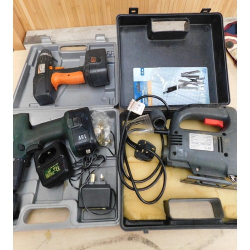 11 - Two battery drills - both W/O but only one charger - plus electric jigsaw W/O