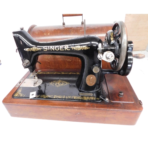 118 - Hand cranked Singer sewing machine