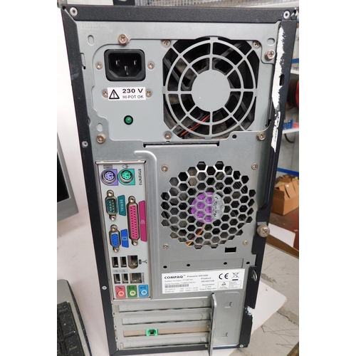 113 - Two computer monitors, keyboard and Compaq Presario PC tower - unchecked