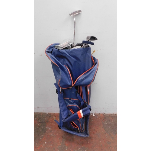 65 - Golf bag - with selection of Bronty putters