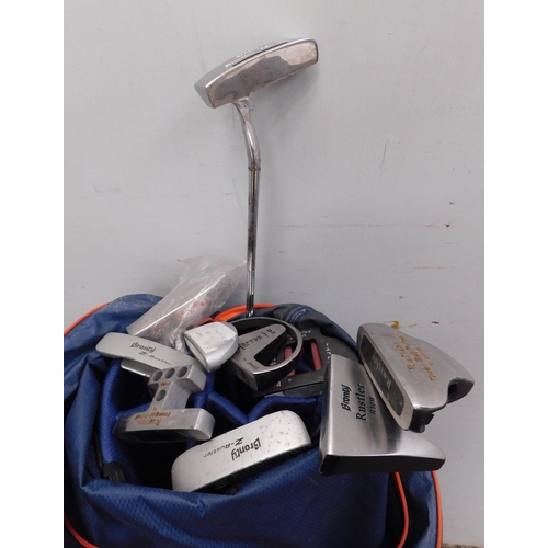 65 - Golf bag - with selection of Bronty putters