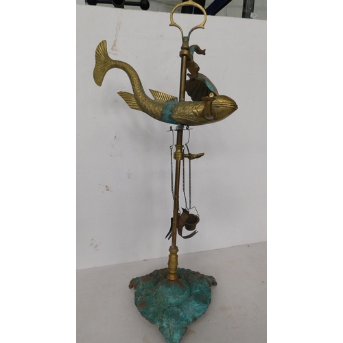 91 - Brass three light oil lamp