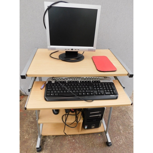 Packard Bell computer system with tower, keyboard, monitor and mouse on ...