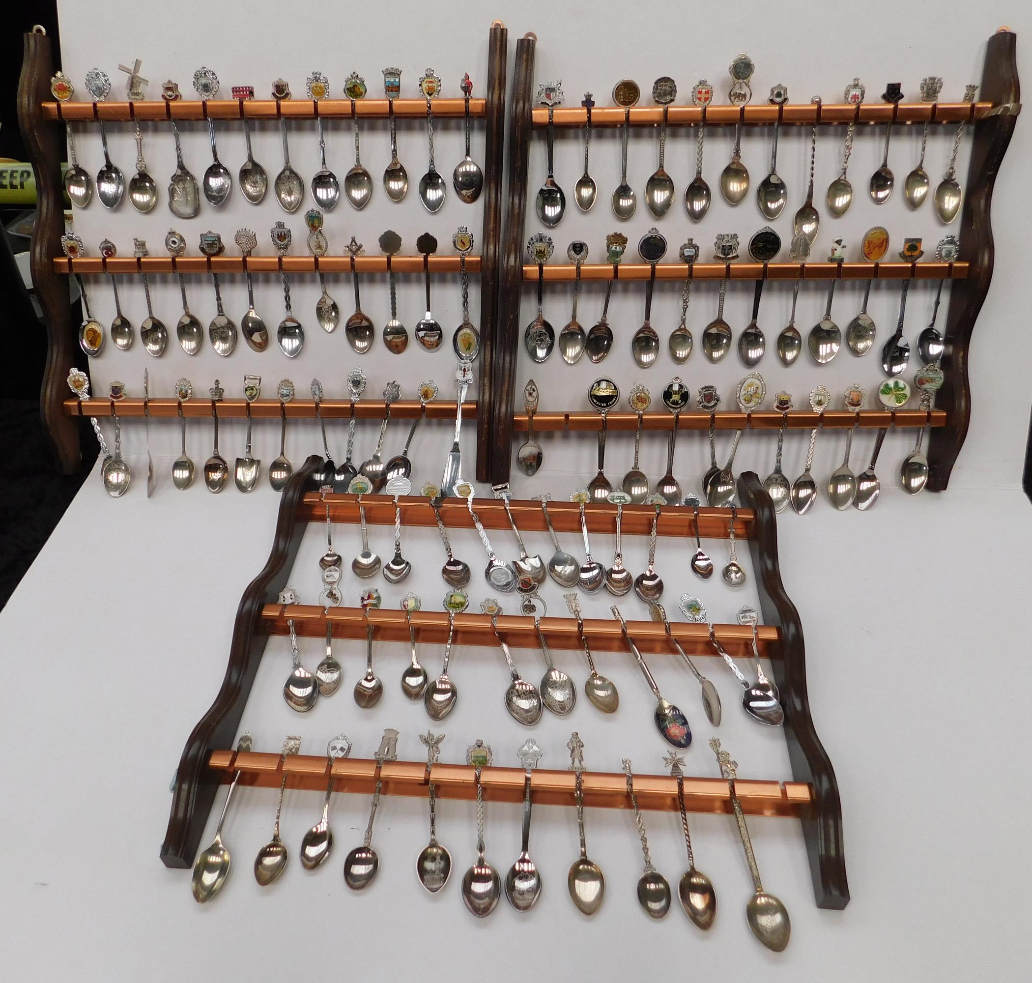Three copper and wood spoon display racks with collectable spoons