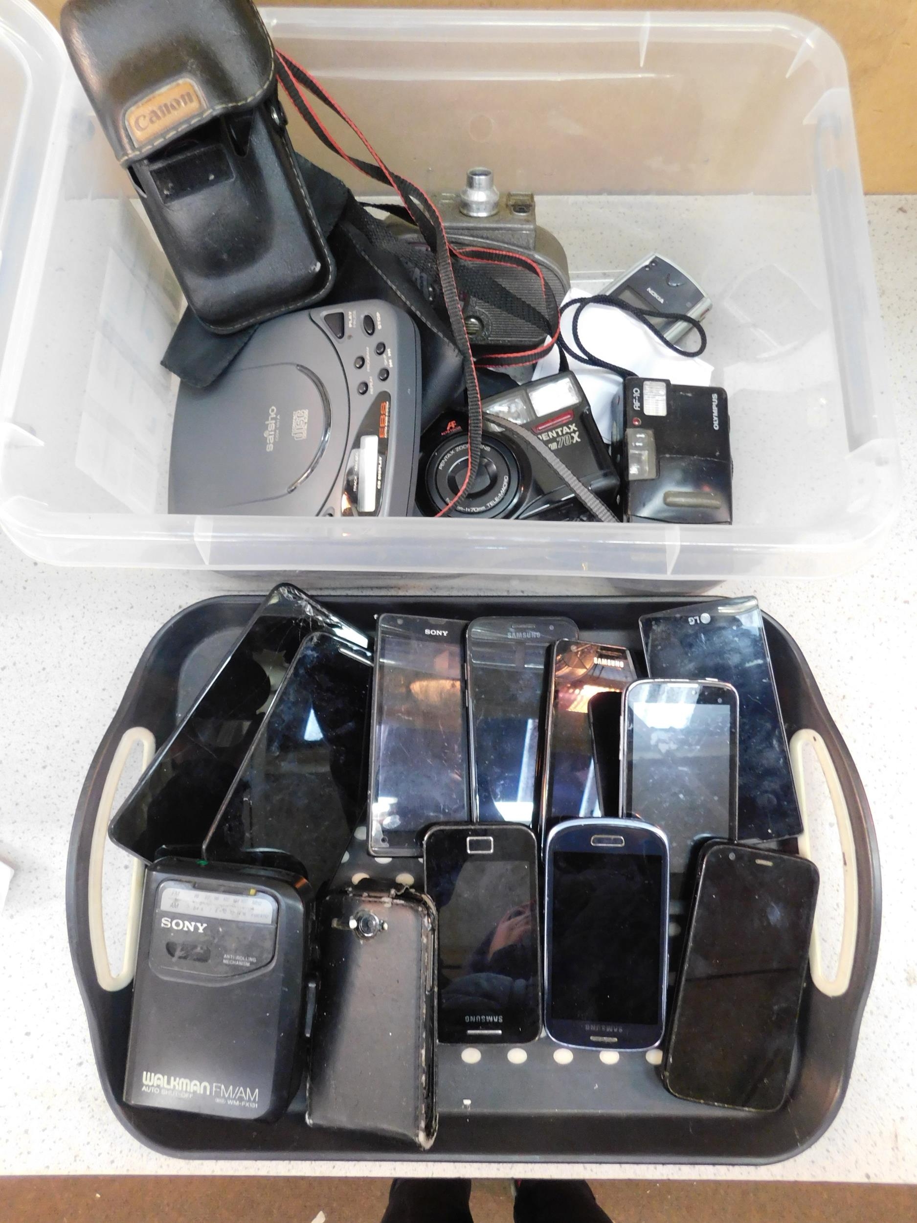 Box of cameras and mobile phones