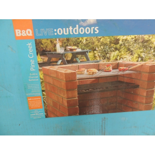 15 - Boxed B&Q build in charcoal BBQ...