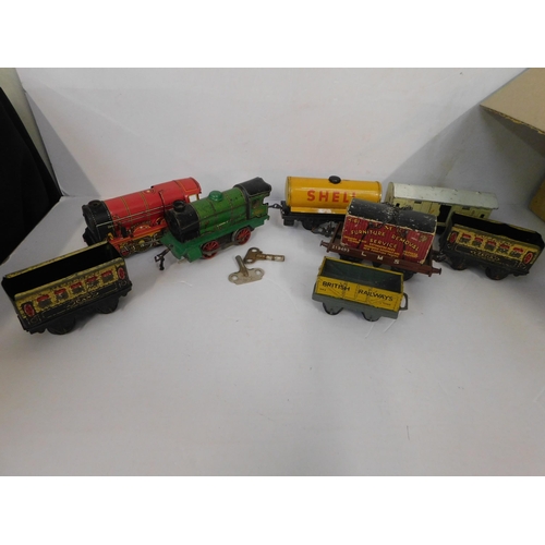 Clockwork 'O' gauge engines, tender/carriages, track etc.